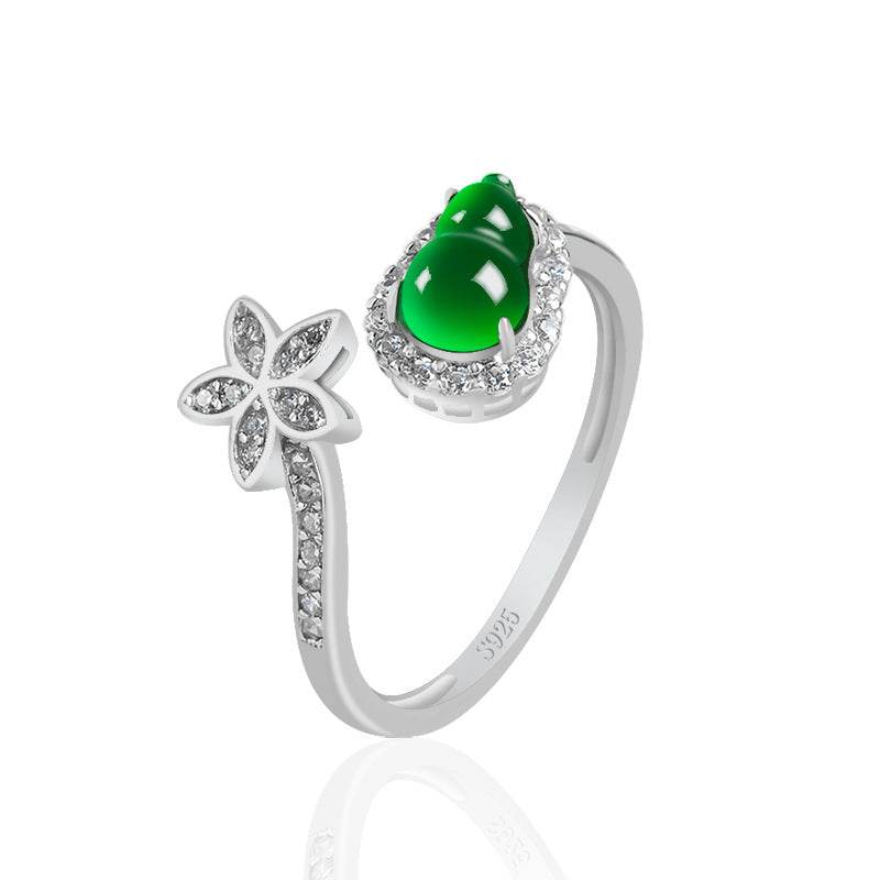Adjustable women’s ring with green jade and flower design in platinum silver