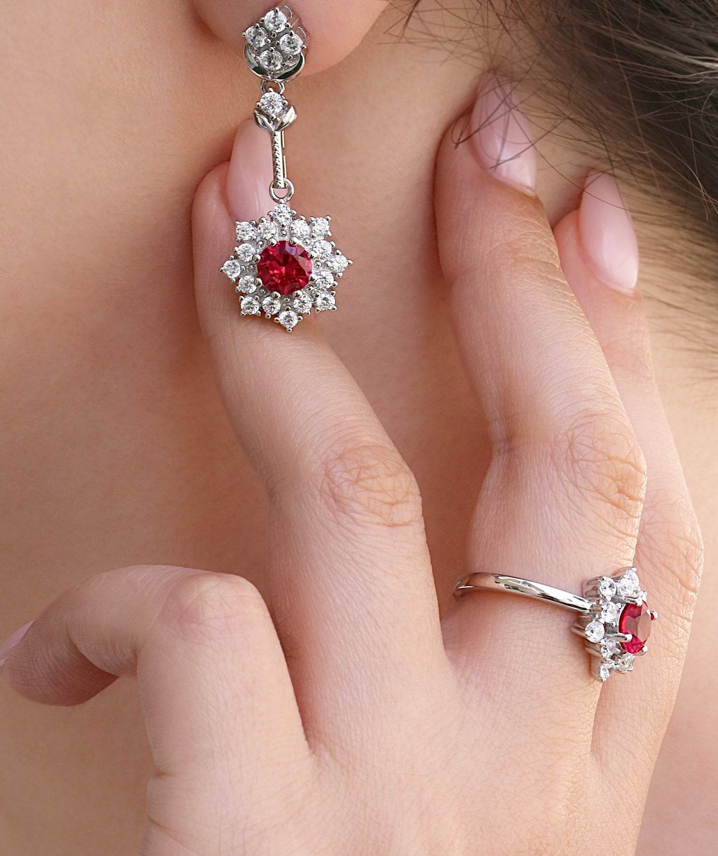 Floral drop earrings with red zirconia stones and white accents