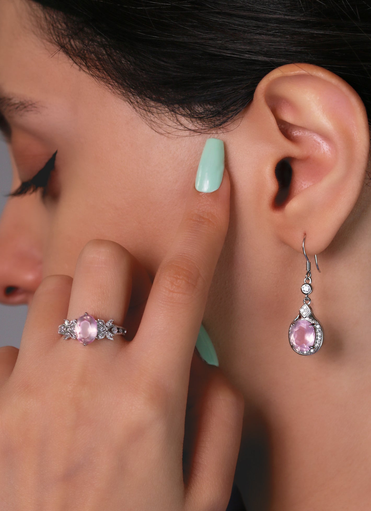 Feminine earrings with pink gemstone and zirconia halo