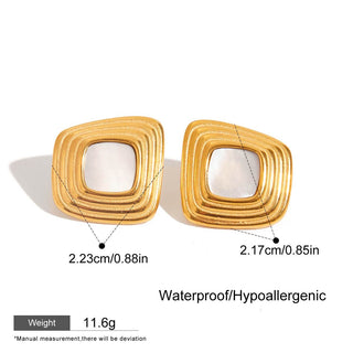 Gold earrings with measurements and product details on a white background