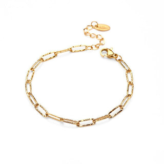 Gold chain bracelet on a white background