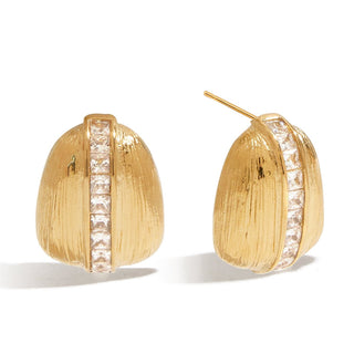 Gold earrings with diamond accents on a white background