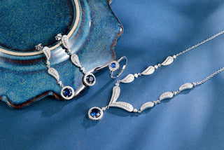 Blue gemstone necklace crafted in rhodium-plated sterling silver with sparkling accents