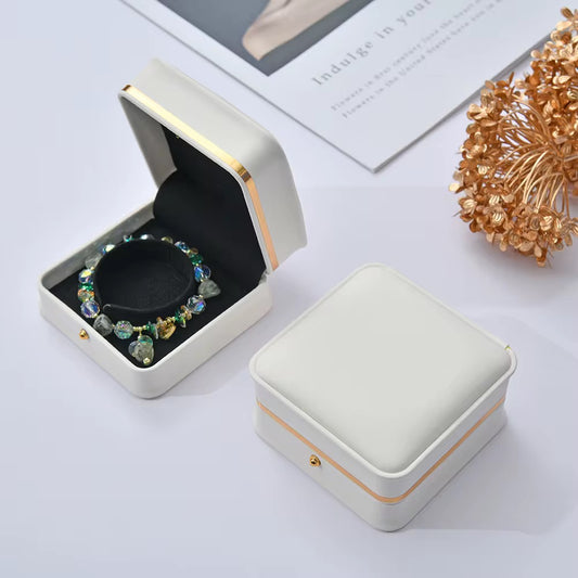 white and gold jewelry box