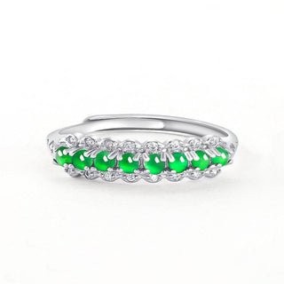 Minimalist green jade ring with zirconia accents in silver band design