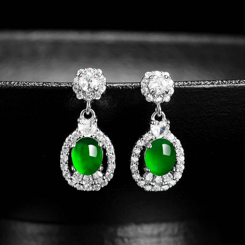 Spiritual gemstone earrings with jade center and radiant sparkle
