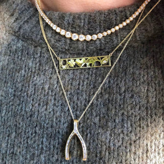 Elegant Gold Necklace with Lucky Pendant