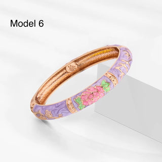 Mint enamel bracelet with detailed lotus flower pattern in gold trim