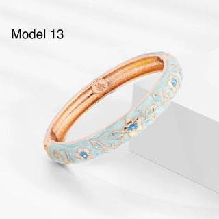 Mint enamel and gold brass bracelet with artistic flower engravings