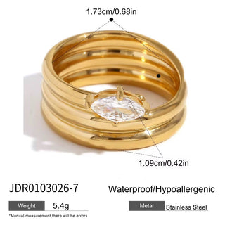 Gold ring with a diamond and measurement details on a white background