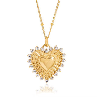 Gold heart-shaped necklace with a chain on a white background