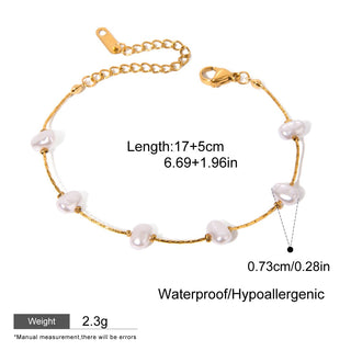 Gold bracelet with pearls on a white background, showing measurements and product details.