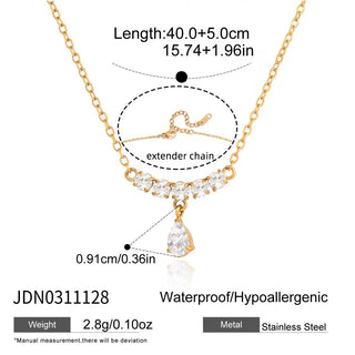 Gold necklace with clear pendant and extender chain, showing measurements and material details.