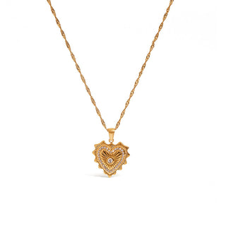 Gold heart-shaped pendant necklace on a white background
