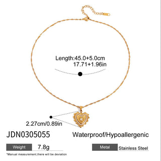 Gold necklace with heart pendant and measurement details on a white background