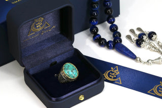 Close-up of handcrafted turquoise gemstone silver ring for men