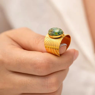 Luxury sunburst engraved turquoise ring