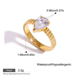 Gold ring with a clear gemstone, showing measurements and product details on a white background.