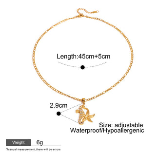 Gold necklace with pendant on a white background, showing measurements and product details.