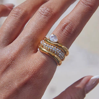 Waterproof gold ring with pear-cut white stone